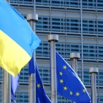 Прапор ЄС на тлі символіки Ukraine Facility